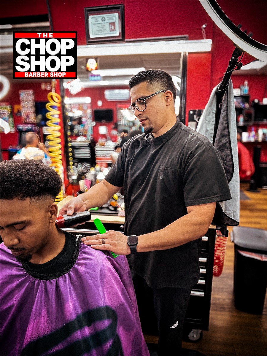 Jose cutting a client's hair